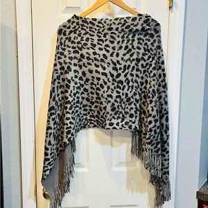 Leopard fuzzy poncho.  Excellent condition.  One size fits all.  Super cute.